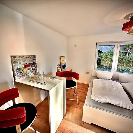 Апартаменты Stylisches See-studio Mit Badezugang & Garten Швиловзе